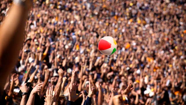 Image for article titled Divided Nation Comes Together To Keep Beach Ball In Air