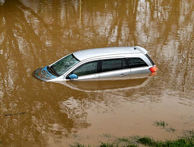 Image for article titled Car Sinking Into Lake Has Hazard Lights On