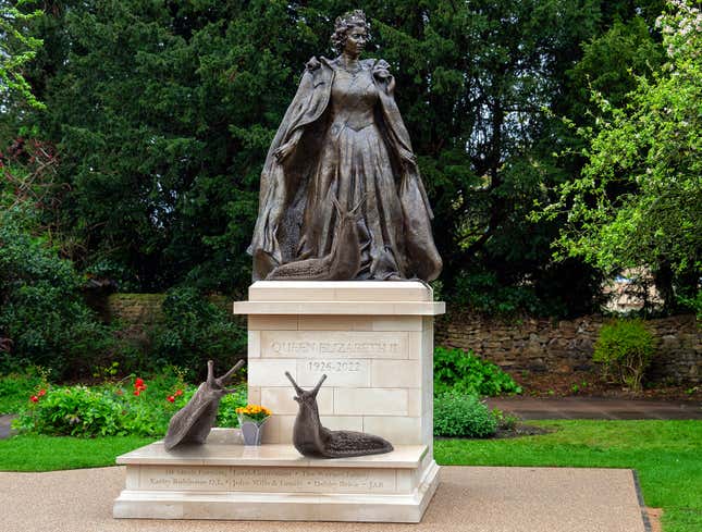 Image for article titled British Sculptor Unveils Memorial Statue Of Queen Elizabeth Surrounded By Her Beloved Slugs