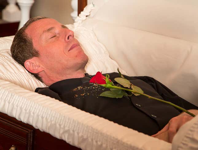 Image for article titled Croissant Flakes Somehow All Over Man&#39;s Burial Suit