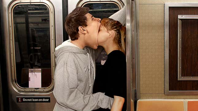 Image for article titled Annoying Teen On Train Has Girlfriend’s Whole Face In Mouth